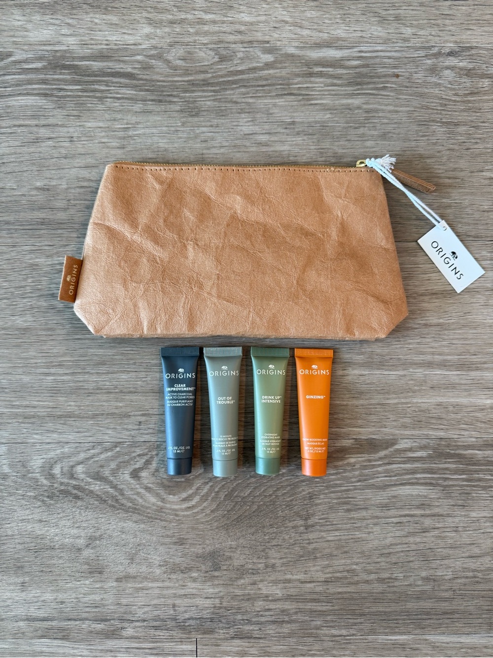 NWT Origins Skincare Set with Tan Pouch and Four Mini Tubes (.5 oz each)